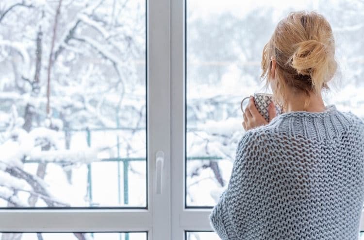 women looking out window